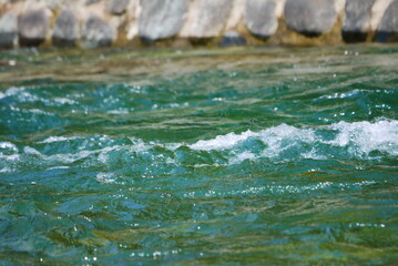 water flowing into the water