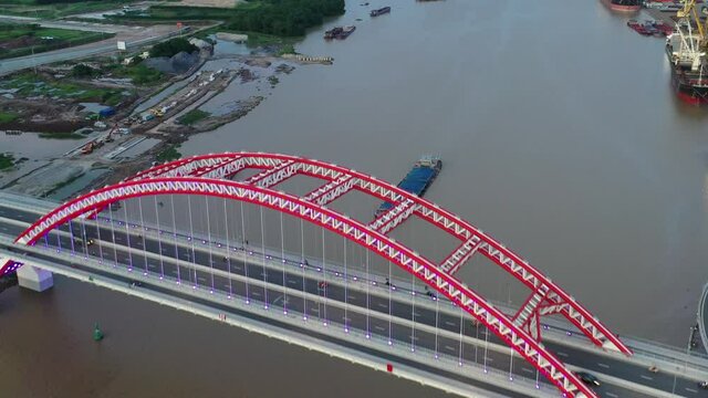 Hai phong, Vietnam Aug 2020 4k aerial video of Hoang Van Thu Bridge during late afternoon