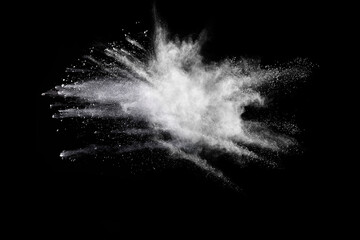 Explosion of white powder isolated on black background. 
