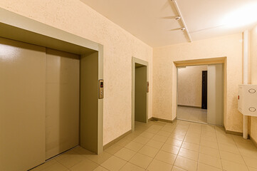 Russia, Moscow- April 10, 2020: interior public place, house entrance. doors, walls, staircase corridors