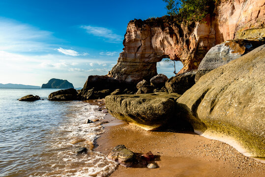 rocks on the beach and blue sky