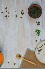 Autumn delicious healthy food, hearty pumpkin soup top view, healthy nutrition on autumn dinner, the concept of thanksgiving day