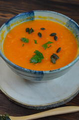 Autumn delicious food, hearty pumpkin soup top view, healthy nutrition on autumn dinner, the concept of thanksgiving day