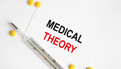 On a purple background a stethoscope with yellow list with text MEDICAL THEORY