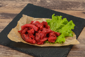 Raw beef meat sliced for cooking