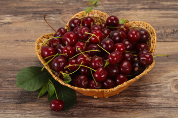 Sweet ripe cherry with leaves