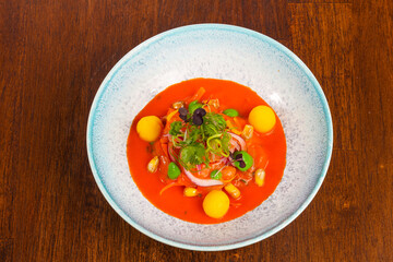 Gazpacho tomato soup with herbs