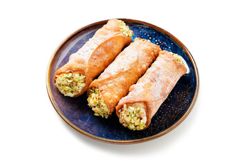 Sweet homemade cannoli stuffed with ricotta cheese and pistachio. Sicilian dessert. Italian pastry. isolated on a white background	