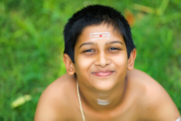 the portrait of indian priest child