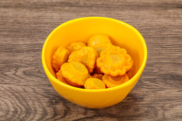 Marinated yellow patisson in the bowl