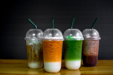 A close-up view of the drinks put into the cup, (iced tea, cocoa, chocolate) with pearls, is a popular menu in cafes and restaurants.