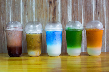 A close-up view of the drinks put into the cup, (iced tea, cocoa, chocolate) with pearls, is a popular menu in cafes and restaurants.