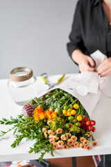 Series, step by step installation of flowers in a vase. Flowers bunch, set for home. Fresh cut flowers for decoration home. European floral shop. Delivery fresh cut flower.