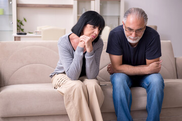 Old couple having argument at home