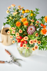 Series, step by step installation of flowers in a vase. Flowers bunch, set for home. Fresh cut flowers for decoration home. European floral shop. Delivery fresh cut flower.