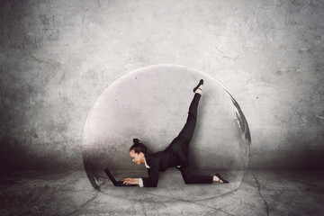 Business woman using a laptop while dancing ballet