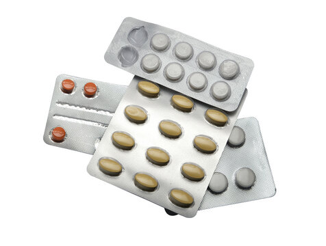 pills in blister pack on white background
