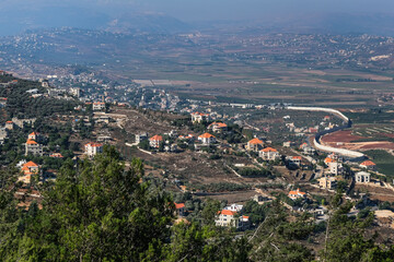 View of Southern Lebanon and Northern Israel with the concrete wall built along the international border, as seen from kibbutz Misgav-Am lookout point, Upper Galilee, Israel.