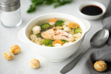 fish soup with pink salmon, cauliflower and broccoli