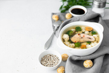 fish soup with pink salmon, cauliflower and broccoli