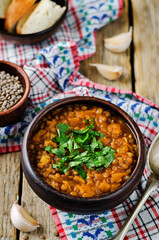 Cabbage Lentil stew in a bowl with parsley