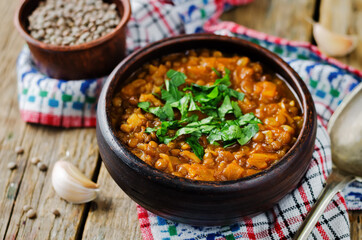 Cabbage Lentil stew in a bowl with parsley