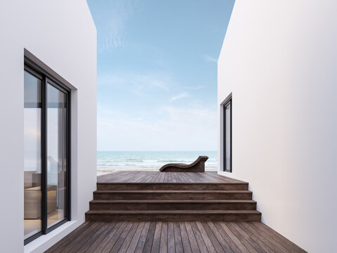 Minimal Style Wooden Courtyard Between White Building With Sea View 3d Render,There Has Dark Wooden Floors,decorated With Rattan Furniture , Overlooking The Sea And Beach.