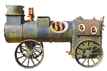 An ancient very small steam locomotive used in agriculture a hundred years ago isolated