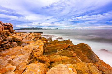 The sea spray hitting the rocks in the afternoon at Khao Laemya National Park Thailand.