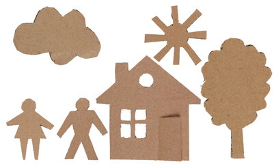 Happy family next to their house and garden  made for cardboard isolated