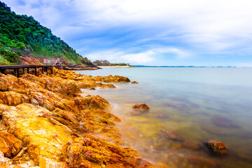 The sea spray hitting the rocks in the afternoon at Khao Laemya National Park Thailand.