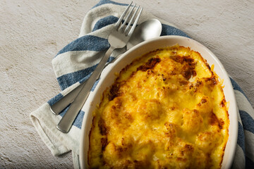 Cauliflower cheese gratin in baking dish