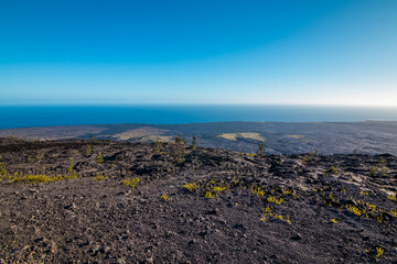 Volcanic landscape and ocean on the horizon. Amazing scenery. Hawaii.