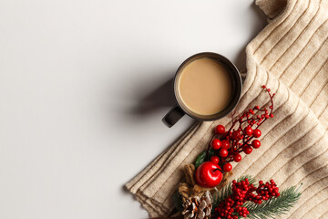 Abstract autumn composition. Colorful background image. Autumn, winter concept. Top view. Flat lay. Copy space. Plaid, dried leaves, cup of coffee on white background. Thanksgiving day concept
