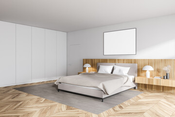 White bedroom corner with poster