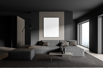Gray living room with grey sofa and poster