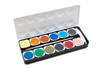 Watercolor paints box with paint brush on white background
