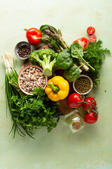 Set of green vegan protein food on green surface