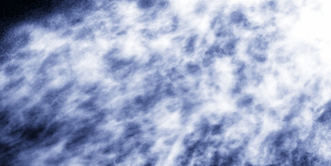 A stream of water and a cloud of drops