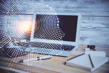 Double exposure of desktop computer and human brain drawing hologram. Ai concept.