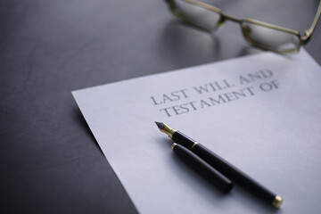 Legal concept. The procedure for writing the last will. Papers with testament on the table....