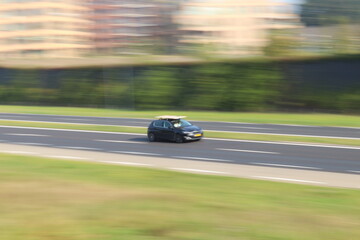 Fototapeta premium car panning on highway.