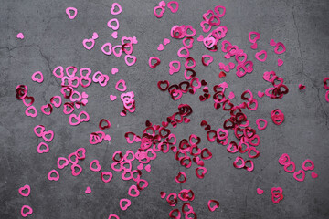 Romantic background. The concept of love and relationships. Heart shaped figures on a dark background. Card for Valentine's Day.