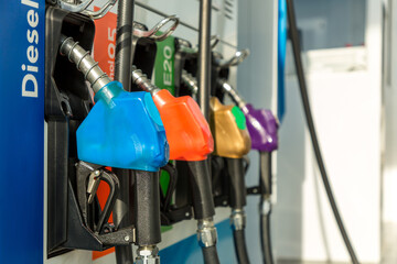 Fuel Pump, Gas Station, Gasoline.Colorful Petrol pump filling nozzles isolated on white background...