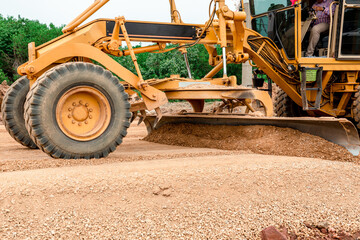 Grader Road Construction Grader industrial machine on construction of new roads. the blade of a...