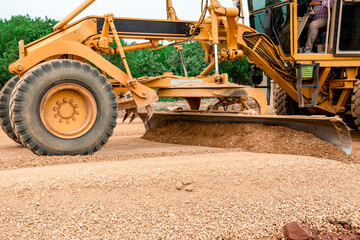 Grader Road Construction Grader industrial machine on construction of new roads. the blade of a...