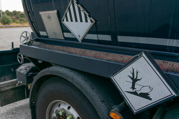 Danger labels on a dangerous goods tank truck
