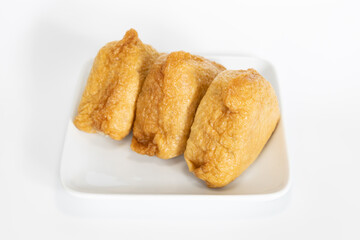 Japanese Inari sushi white background