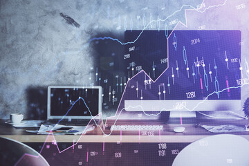 Double exposure of graph and financial info and work space with computer background. Concept of...