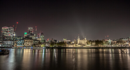 Fototapeta na wymiar View of the Tower of London at night with bright lights
